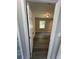 View into a bedroom from a doorway; gray plank flooring and a window are visible at 3730 Clovis Nw Ct, Atlanta, GA 30331