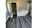 Bedroom with closet and gray wood-look flooring at 3730 Clovis Nw Ct, Atlanta, GA 30331