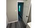 Hallway featuring luxury vinyl plank flooring and neutral paint at 3730 Clovis Nw Ct, Atlanta, GA 30331