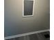 Small hallway with fresh paint and gray floors at 3730 Clovis Nw Ct, Atlanta, GA 30331