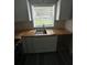 Kitchen sink with wooden countertops and bright natural light at 3730 Clovis Nw Ct, Atlanta, GA 30331