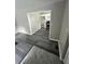 Open floor plan with view of the kitchen with white cabinets at 3730 Clovis Nw Ct, Atlanta, GA 30331