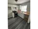 Bright kitchen with white cabinets, butcher block countertop, and stainless steel appliances at 3730 Clovis Nw Ct, Atlanta, GA 30331