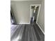 Spacious living room featuring durable vinyl flooring and neutral paint at 3730 Clovis Nw Ct, Atlanta, GA 30331