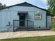 View of the side and back of the home showcasing the new paint and fenced backyard at 3730 Clovis Nw Ct, Atlanta, GA 30331