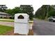 Street view of the property, featuring a stone mailbox with the house number at 4296 Langdon Dr, Decatur, GA 30035