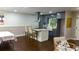 Open-concept kitchen featuring modern appliances, a kitchen island, and stylish decor at 4296 Langdon Dr, Decatur, GA 30035