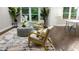 Inviting living room with elegant furnishings, large windows, and hardwood floors at 4296 Langdon Dr, Decatur, GA 30035