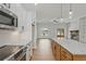 Spacious kitchen with a center island, granite countertops, stainless steel appliances, and hardwood floors at 85 Presley Farm Pkwy, Rockmart, GA 30153