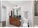 Bathroom with granite countertop vanity, and a beige tiled shower in the background at 855 Peachtree Ne St # 1508, Atlanta, GA 30308