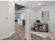 Bright home office space featuring wood floors, sleek desk, and an art piece at 855 Peachtree Ne St # 1508, Atlanta, GA 30308