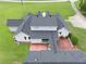 A close up aerial view featuring the roof and a red brick patio and walkway at 2759 Bay Ridge Dr, Loganville, GA 30052