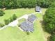 Aerial view of home showing well-kept landscaping and detached garage on large lot at 2759 Bay Ridge Dr, Loganville, GA 30052