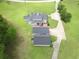 Expansive aerial view of a well-manicured property featuring lush lawns and a long driveway at 2759 Bay Ridge Dr, Loganville, GA 30052
