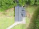 Aerial view of the roof, driveway, and professional landscaping elements at 2759 Bay Ridge Dr, Loganville, GA 30052
