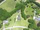 Aerial view of beautiful home, long driveway, and well maintained property at 2759 Bay Ridge Dr, Loganville, GA 30052