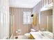 Bathroom with vertically striped wallpaper, featuring a vanity sink, toilet, and glass shower enclosure at 2759 Bay Ridge Dr, Loganville, GA 30052