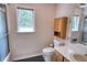 Bathroom with a window with views of the backyard at 2759 Bay Ridge Dr, Loganville, GA 30052