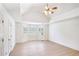 Large bedroom with a ceiling fan, wood floors, and a bay window with shutters at 2759 Bay Ridge Dr, Loganville, GA 30052