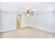 Bright bedroom with wood floors and white walls with multiple doorways at 2759 Bay Ridge Dr, Loganville, GA 30052