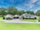 An estate view on a bright sunny day at 2759 Bay Ridge Dr, Loganville, GA 30052