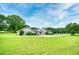 This single-story home features a welcoming front porch and well-maintained landscaping at 2759 Bay Ridge Dr, Loganville, GA 30052