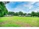 Expansive green lawn showcasing this home's exterior and beautiful landscaping at 2759 Bay Ridge Dr, Loganville, GA 30052