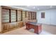 This home office has lots of built in wood shelving and a desk at 2759 Bay Ridge Dr, Loganville, GA 30052