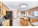 Well-lit kitchen featuring a center island, granite counters, and ample storage at 2759 Bay Ridge Dr, Loganville, GA 30052