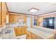 Functional kitchen with granite countertops, custom cabinetry, and modern appliances at 2759 Bay Ridge Dr, Loganville, GA 30052