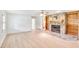 Spacious living room with stone fireplace, built-in shelves, and lots of natural light at 2759 Bay Ridge Dr, Loganville, GA 30052