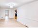 Spacious living room features light wood floors, white walls, and elegant trim at 2759 Bay Ridge Dr, Loganville, GA 30052