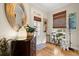 Inviting entryway featuring hardwood floors and stylish décor at 2797 Middlecreek Way, Cumming, GA 30041