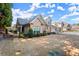 Charming exterior showcasing a well-manicured lawn and mature landscaping at 2797 Middlecreek Way, Cumming, GA 30041