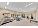 Well-equipped gym with treadmills, exercise bikes, and weight machines for a complete workout at 2797 Middlecreek Way, Cumming, GA 30041