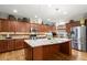 Modern kitchen with stainless steel appliances and granite countertops at 2797 Middlecreek Way, Cumming, GA 30041