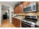 Well-appointed kitchen with stainless steel appliances and ample counter space at 2797 Middlecreek Way, Cumming, GA 30041