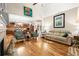 Comfortable living room with an open layout and hardwood floors at 2797 Middlecreek Way, Cumming, GA 30041