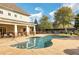 Community pool featuring comfortable lounge chairs for relaxing near the water and mature landscaping at 2797 Middlecreek Way, Cumming, GA 30041