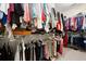 Large walk-in closet with ample hanging space and shelving for optimal organization at 2797 Middlecreek Way, Cumming, GA 30041