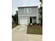 Charming two-story home with a one-car garage, complemented by a well-maintained lawn at 3558 Eagle Court, Fulton, GA 30331