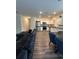 Spacious open-concept living room and kitchen with stainless steel appliances and modern finishes at 3558 Eagle Court, Fulton, GA 30331