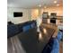Stylish living and dining area with a sleek dark dining table and modern furniture at 3558 Eagle Court, Fulton, GA 30331