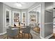 Cozy dining nook with bay window, seating, and mirrored closet at 4971 Jenny Dr, Acworth, GA 30101