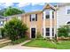Charming home exterior with lush green lawn and neat landscaping at 4971 Jenny Dr, Acworth, GA 30101