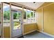 Sunroom with multiple windows overlooking the backyard at 4971 Jenny Dr, Acworth, GA 30101