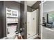 Modern bathroom featuring a toilet, vanity, and walk-in shower with glass doors at 6901 Gallant Se Cir # 13, Mableton, GA 30126
