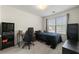 Bright bedroom with a large window, desk, and comfortable bed, ideal for relaxing and working at 6901 Gallant Se Cir # 13, Mableton, GA 30126