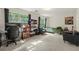 Bright, carpeted room with lots of natural light from large windows and comfortable sitting area and desk at 6901 Gallant Se Cir # 13, Mableton, GA 30126