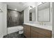 Bathroom with double vanity, granite countertop, tile backsplash, and luxury fixtures at 12230 Asbury Park Dr, Roswell, GA 30075